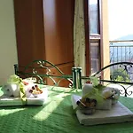 Rosy Gallo Couette-café *